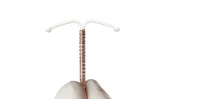 IUD held by physician